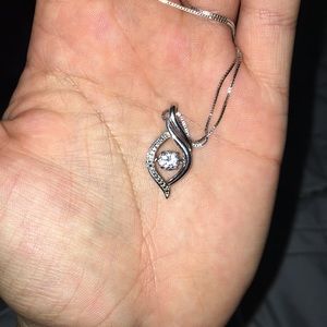 silver “diamond” necklace.